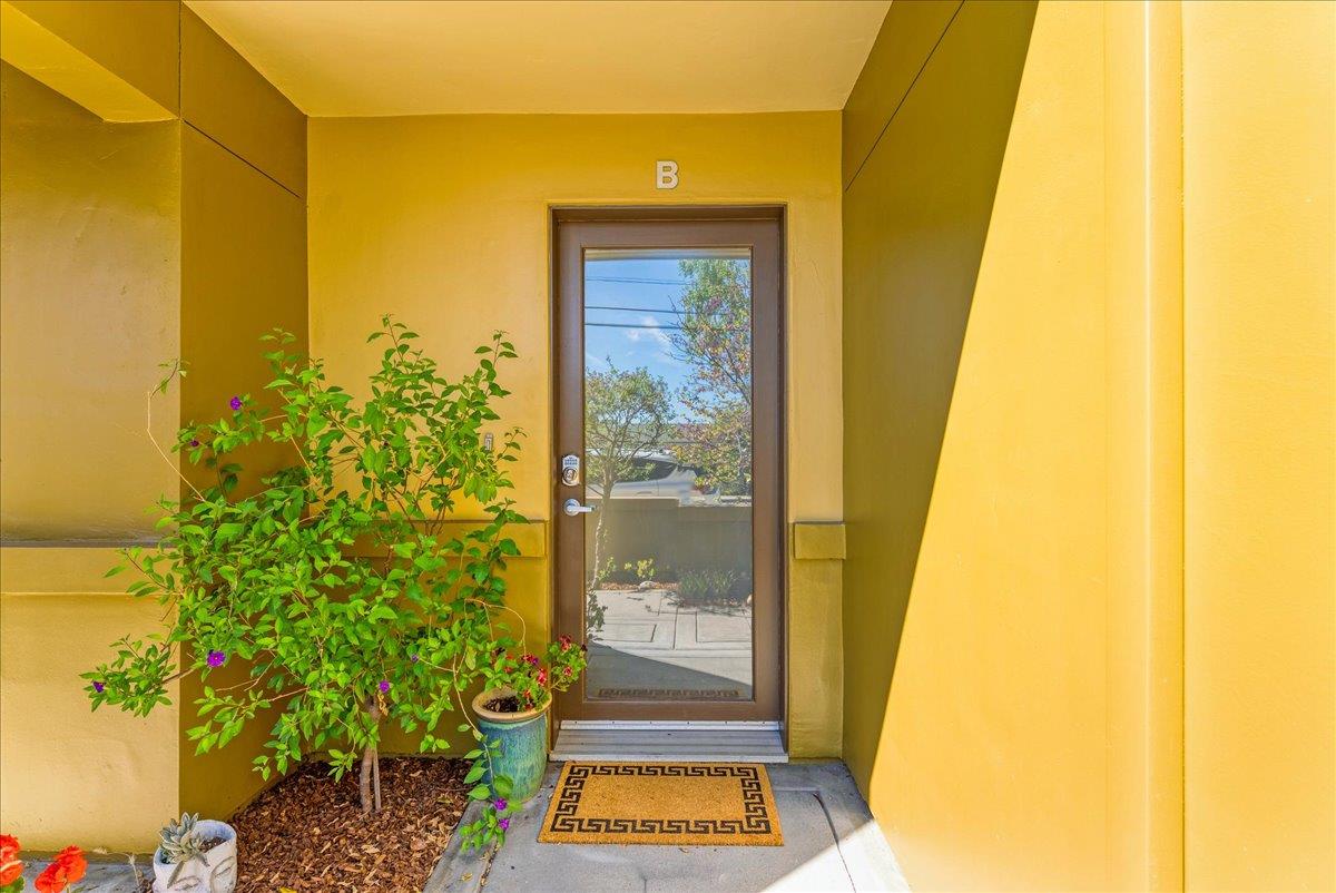 117 Gault Street, Unit B Santa Cruz, CA 95062 - Photo 4 of 42 a view of a door and chair