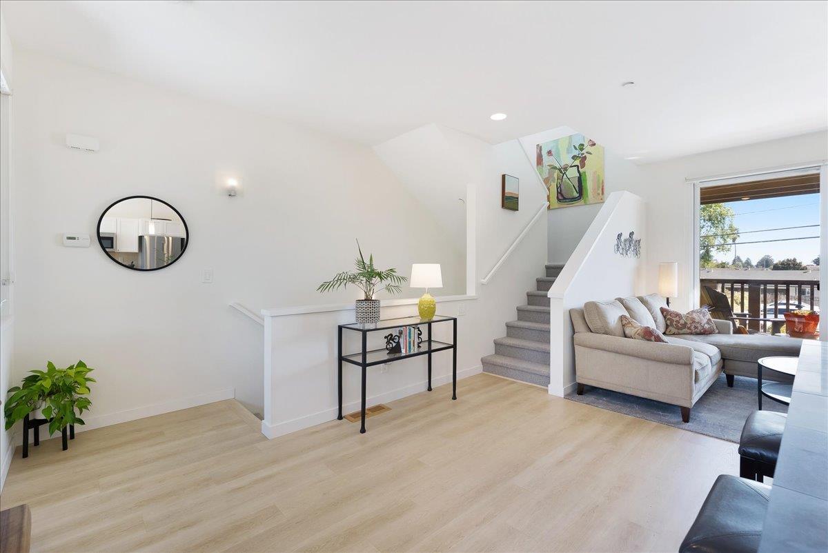 117 Gault Street, Unit B Santa Cruz, CA 95062 - Photo 7 of 42 a living room with furniture and wooden floor
