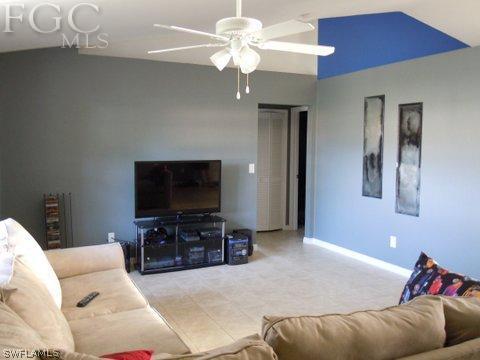 17552 Ingram Road Fort Myers, FL 33967 - Photo 3 of 5 a living room with furniture and a flat screen tv