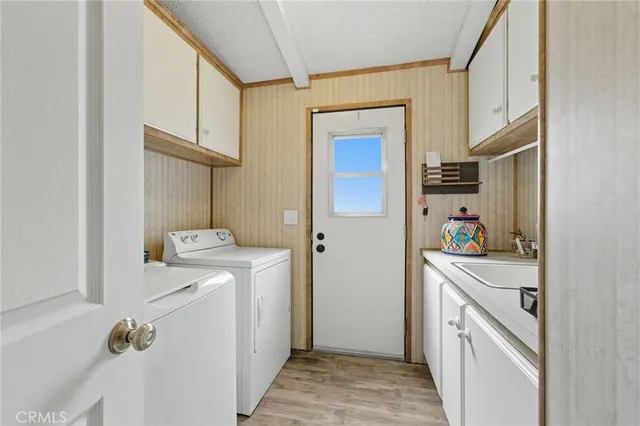 a bathroom with a shower and a glass door