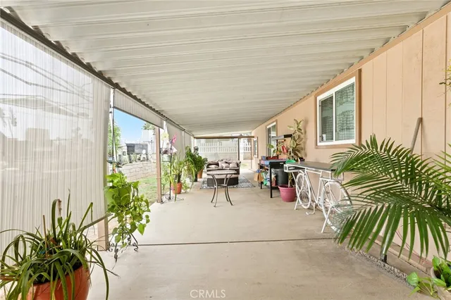 an aerial view of house with yard