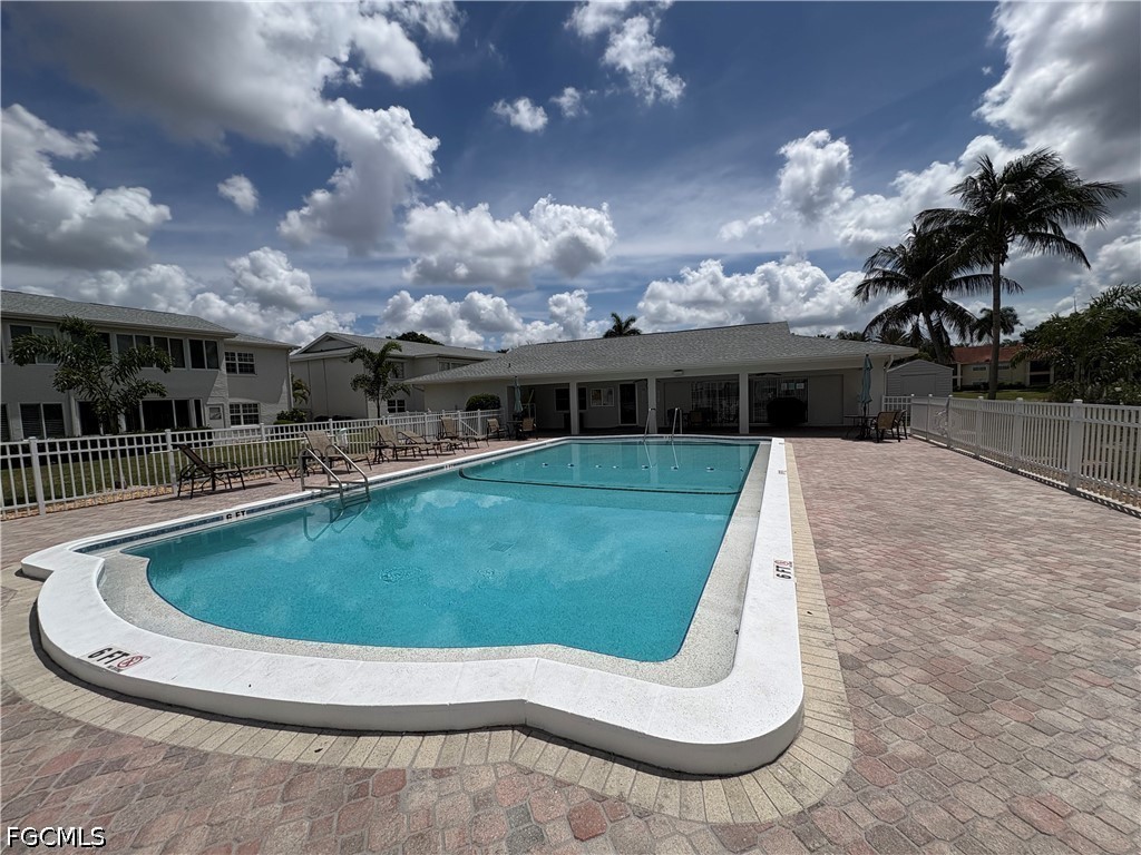 1830 Brantley Road, Unit I7 Fort Myers, FL 33907 - Photo 33 of 34 a view of a house with swimming pool