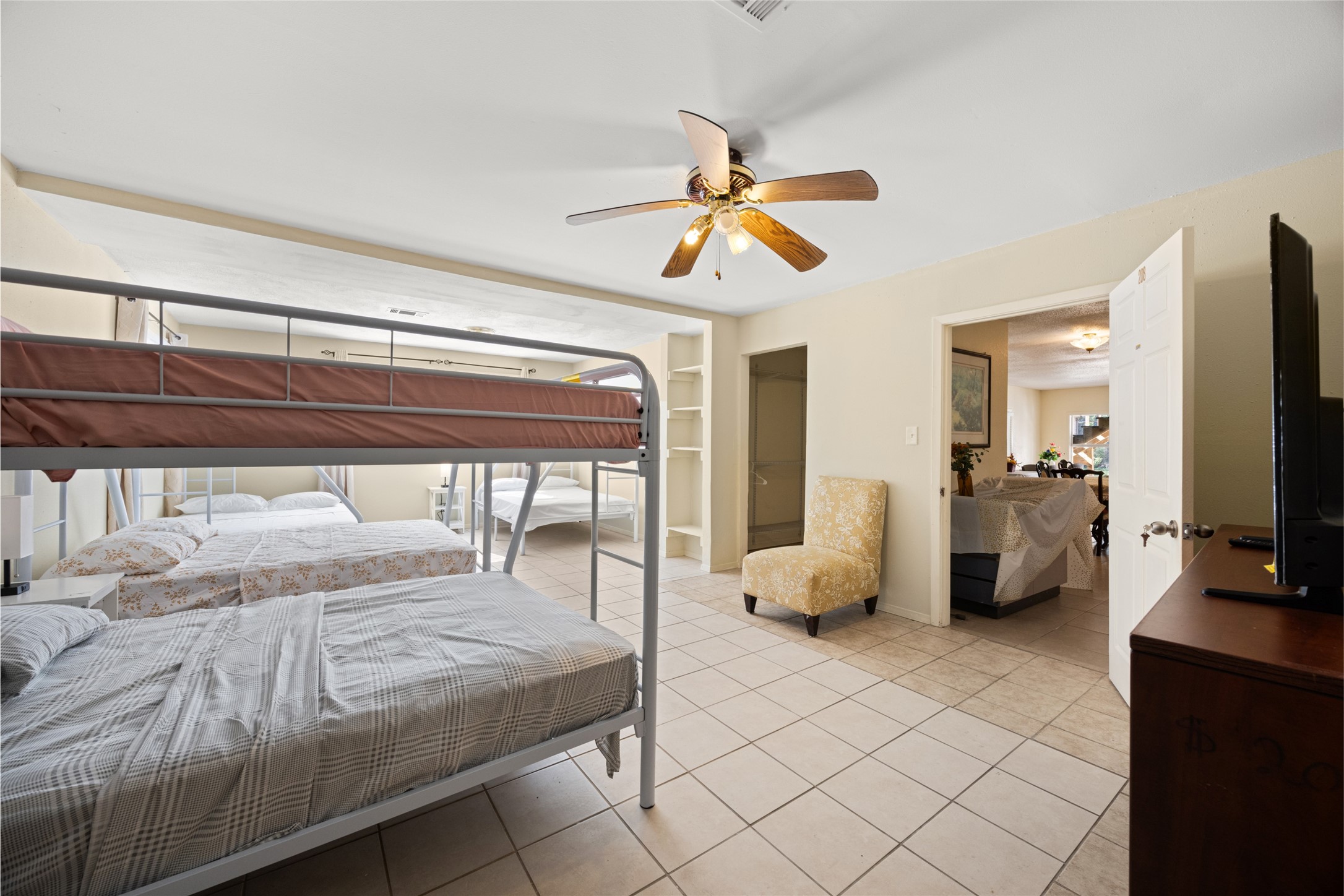 25231 Roesner Lane Katy, TX 77494 - Photo 19 of 48 a bedroom with a bed and large mirror