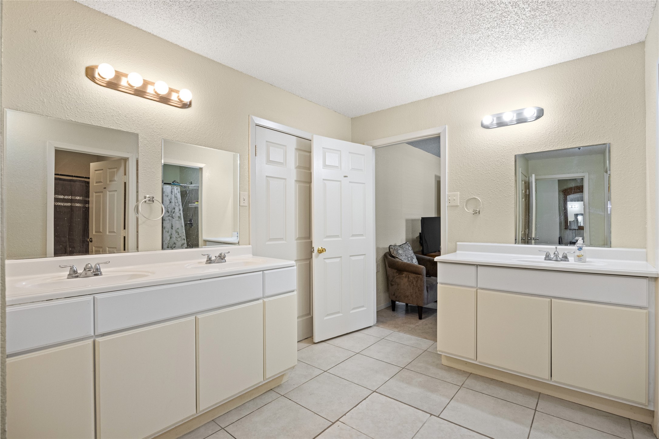 25231 Roesner Lane Katy, TX 77494 - Photo 23 of 48 a spacious bathroom with a double vanity sink mirror and toilet