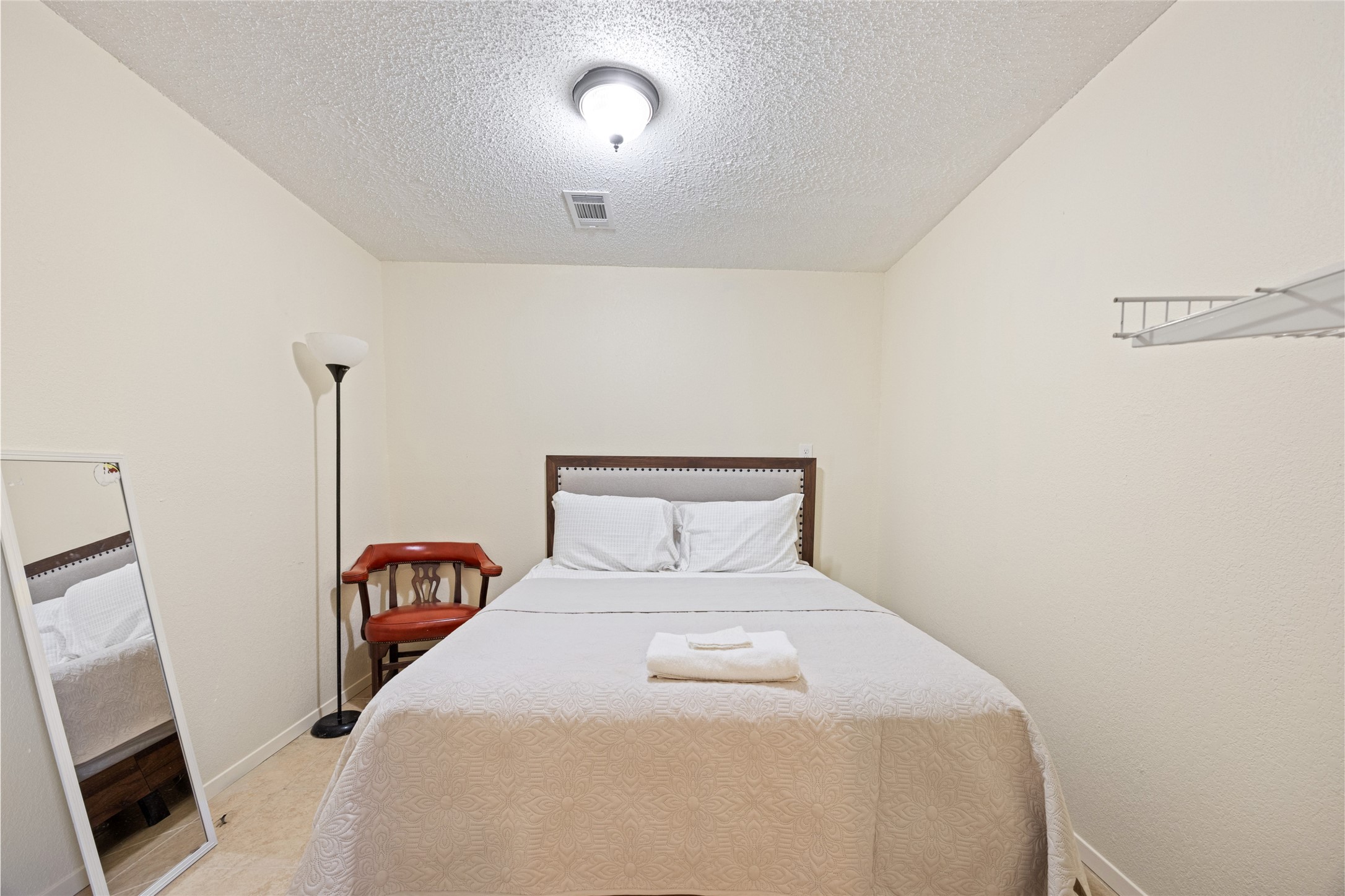 25231 Roesner Lane Katy, TX 77494 - Photo 29 of 48 a bed room with a bed and a tv