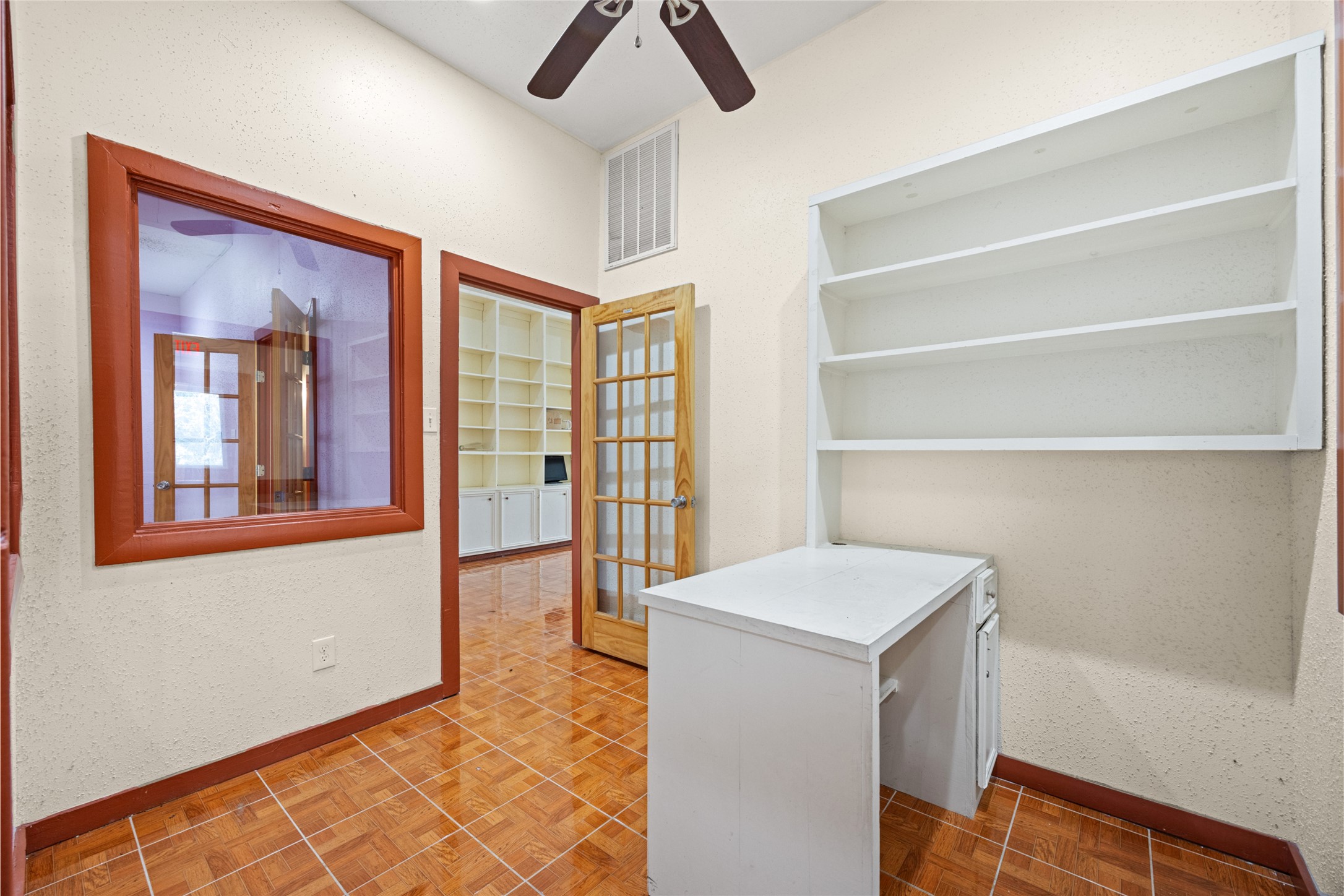 25231 Roesner Lane Katy, TX 77494 - Photo 34 of 48 a view of an empty room with wooden floor and a window