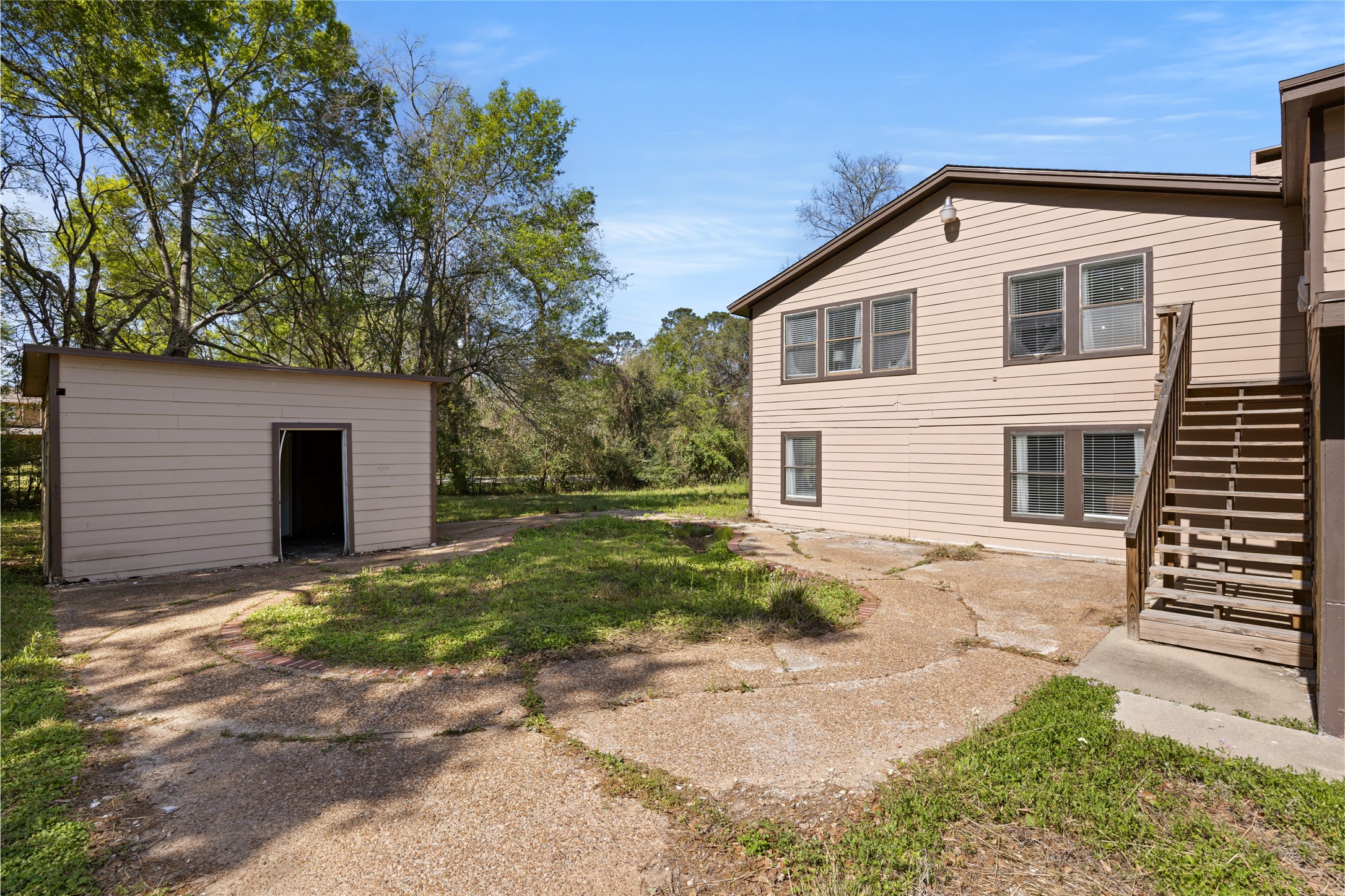 25231 Roesner Lane Katy, TX 77494 - Photo 46 of 48 a front view of a house with a yard and garage