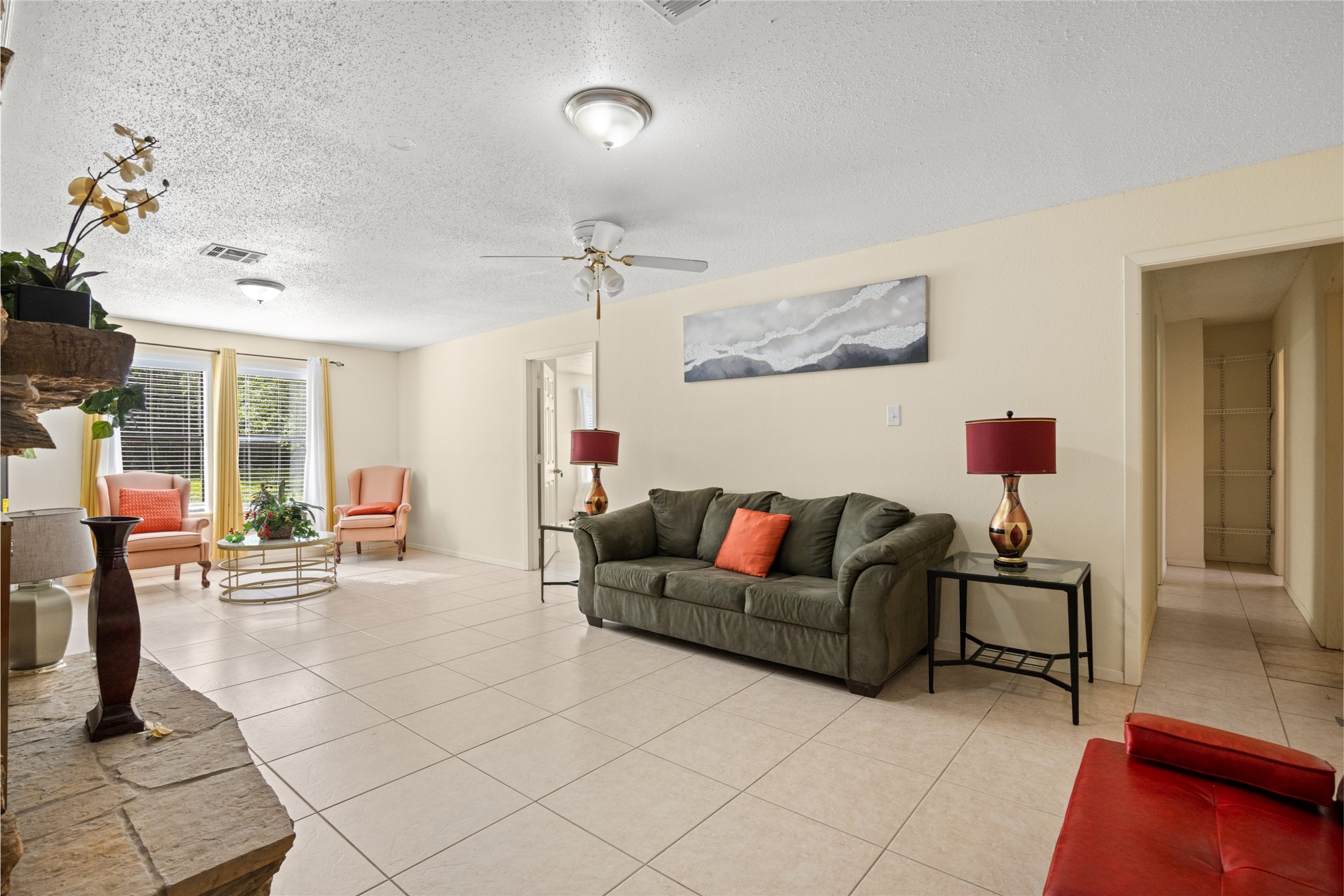 25231 Roesner Lane Katy, TX 77494 - Photo 7 of 48 a living room with furniture and a mirror
