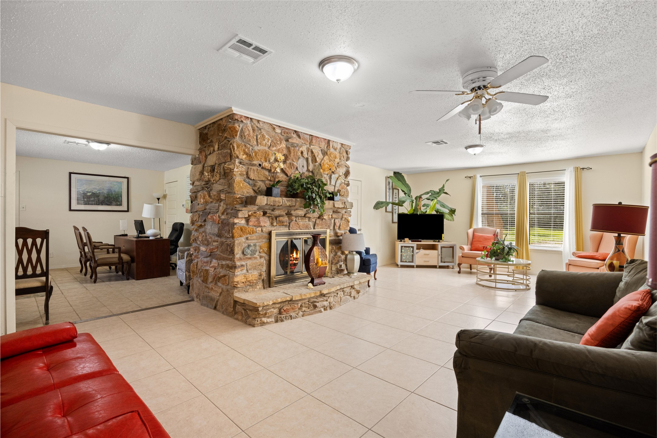 25231 Roesner Lane Katy, TX 77494 - Photo 8 of 48 a living room with furniture and a flat screen tv