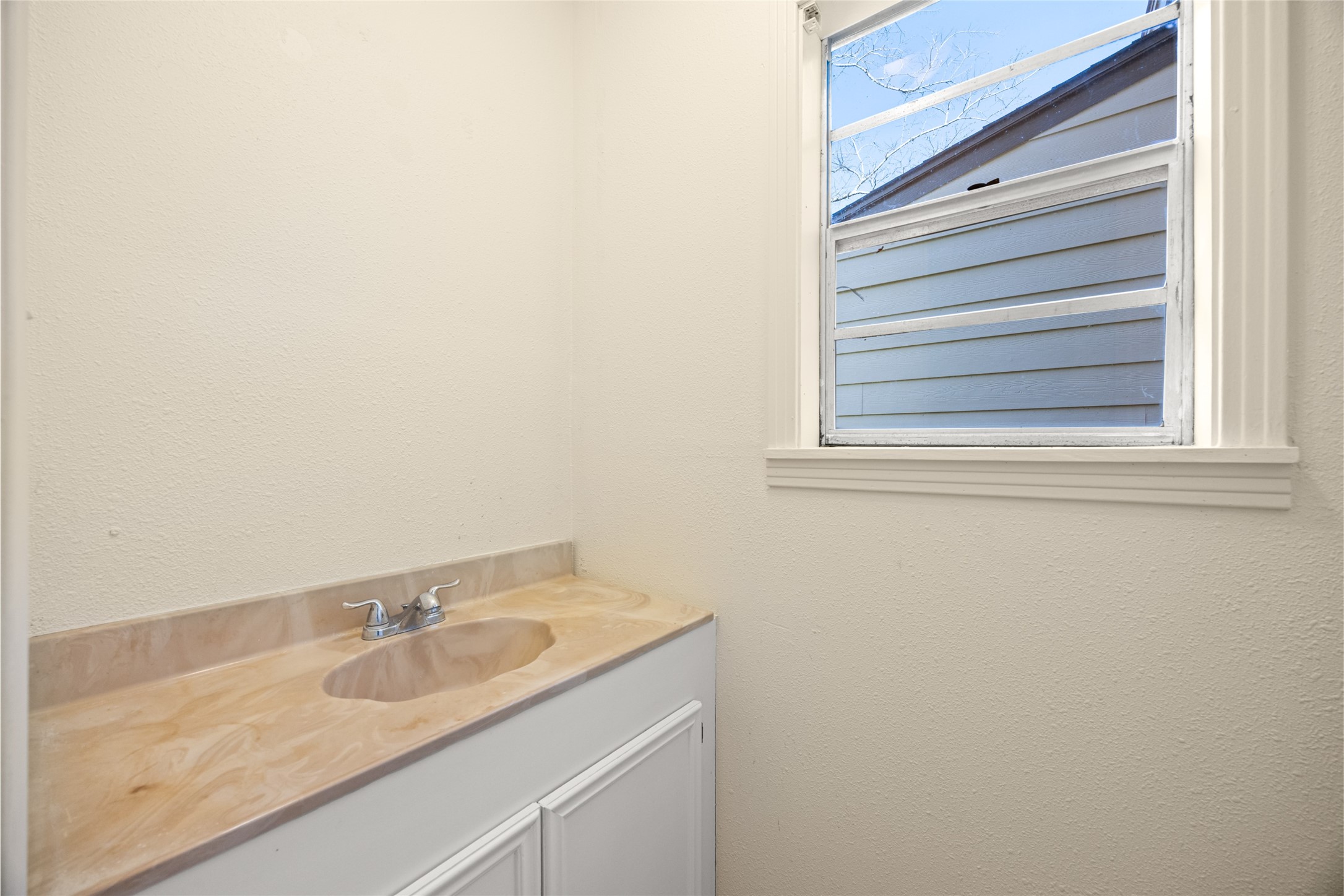 25231 Roesner Lane Katy, TX 77494 - Photo 10 of 48 a bathroom with a granite countertop sink and a mirror