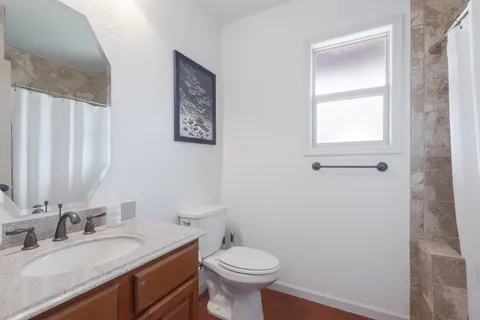 a view of balcony with furniture