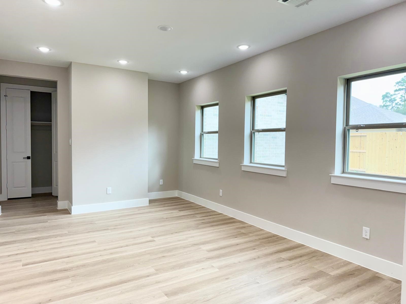2606 Liguria Ln Spring Spring, TX 77388 - Photo 7 of 29 a view of empty room with window and wooden floor
