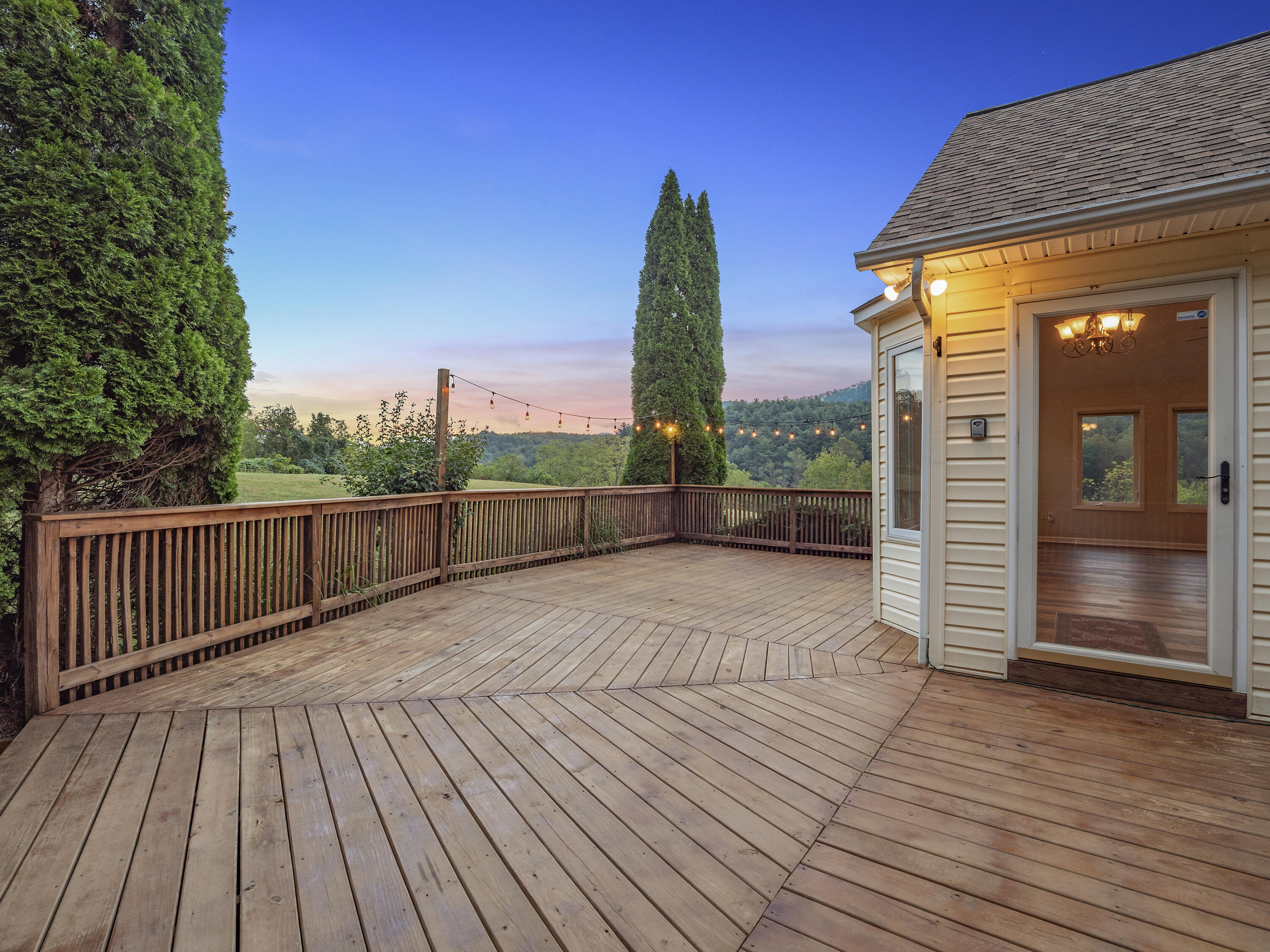 885 Whetstone Road Ferrum, VA 24088 - Photo 47 of 64 a view of a balcony with wooden floor and fence