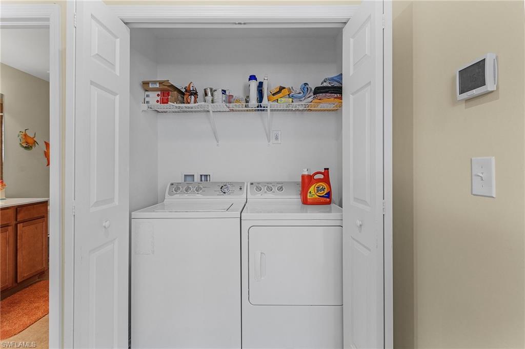 3732 Pino Vista Way, Unit 2 Estero, FL 33928 - Photo 21 of 29 a utility room with dryer and washer