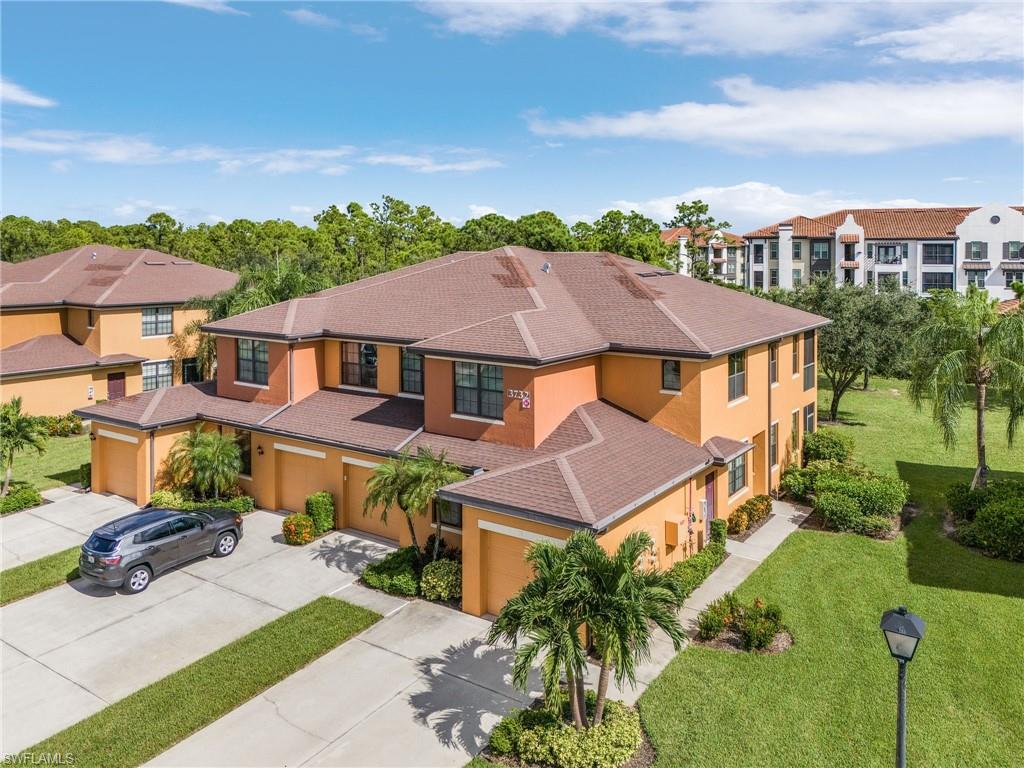 3732 Pino Vista Way, Unit 2 Estero, FL 33928 - Photo 24 of 29 a aerial view of a house with swimming pool garden and patio