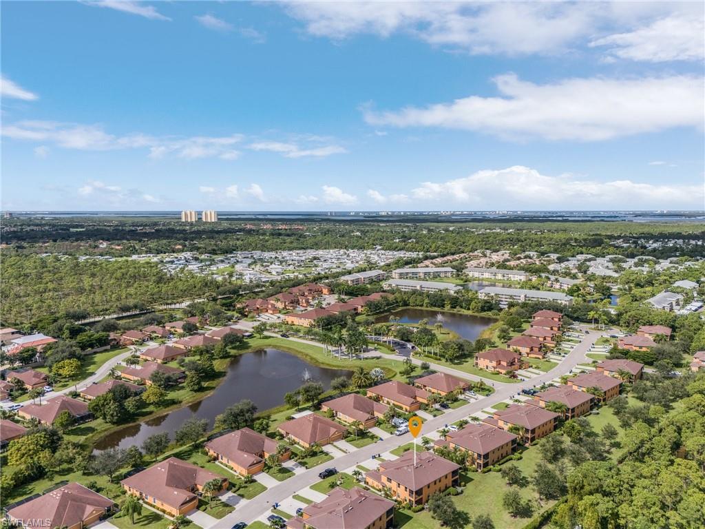 3732 Pino Vista Way, Unit 2 Estero, FL 33928 - Photo 26 of 29 an aerial view of city and lake