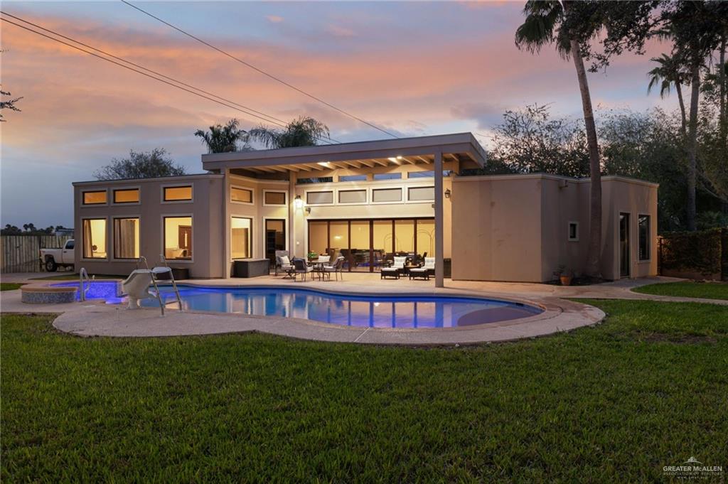 809 Rio Grande Drive Mission, TX 78572 - Photo 27 of 45 a view of a house with a backyard patio and swimming pool