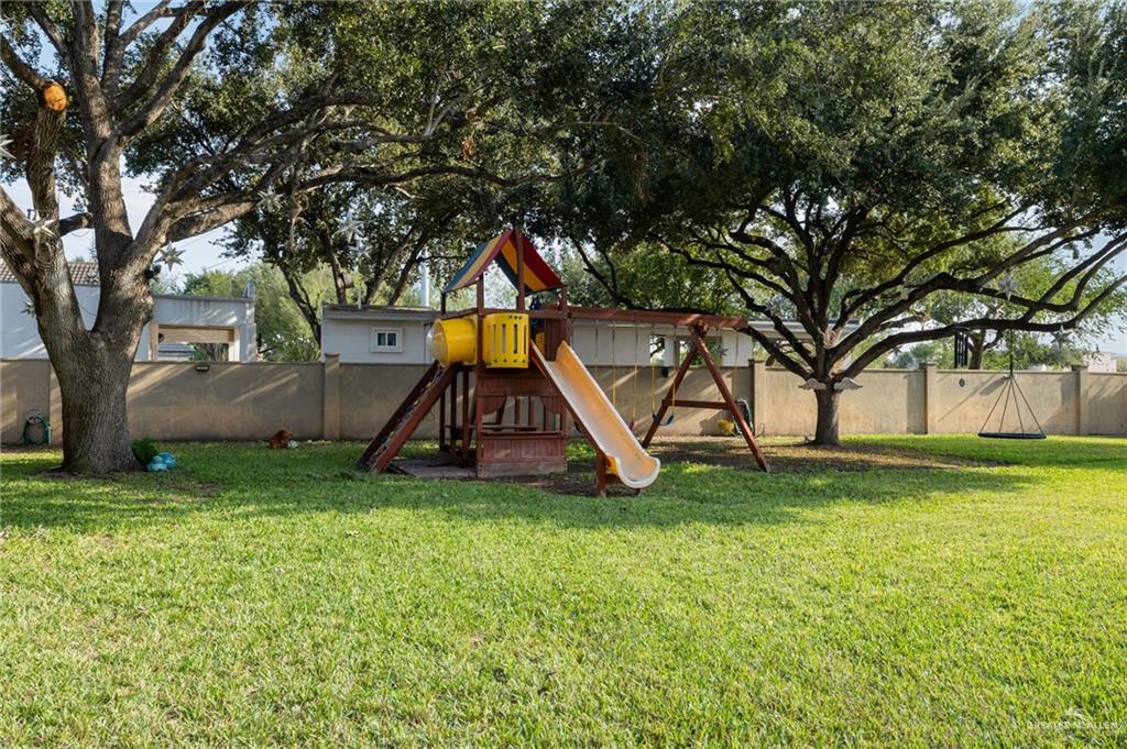 809 Rio Grande Drive Mission, TX 78572 - Photo 39 of 45 a view of outdoor space with deck and green space