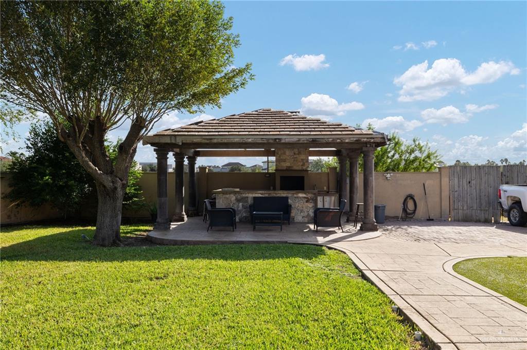 809 Rio Grande Drive Mission, TX 78572 - Photo 42 of 45 a view of a house with backyard porch and sitting area