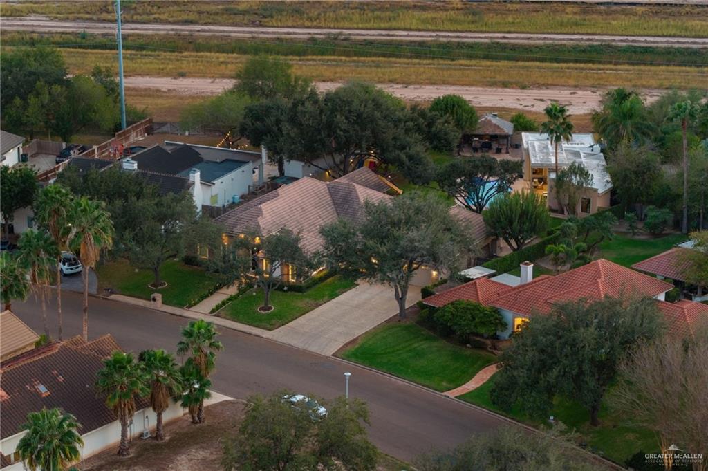 809 Rio Grande Drive Mission, TX 78572 - Photo 43 of 45 a view of a lake with a house
