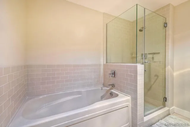 a view of a balcony with chairs