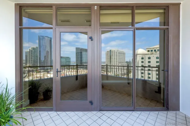 a front view of a building with garden