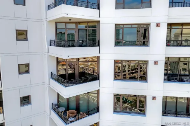 a view of wooden floor and windows