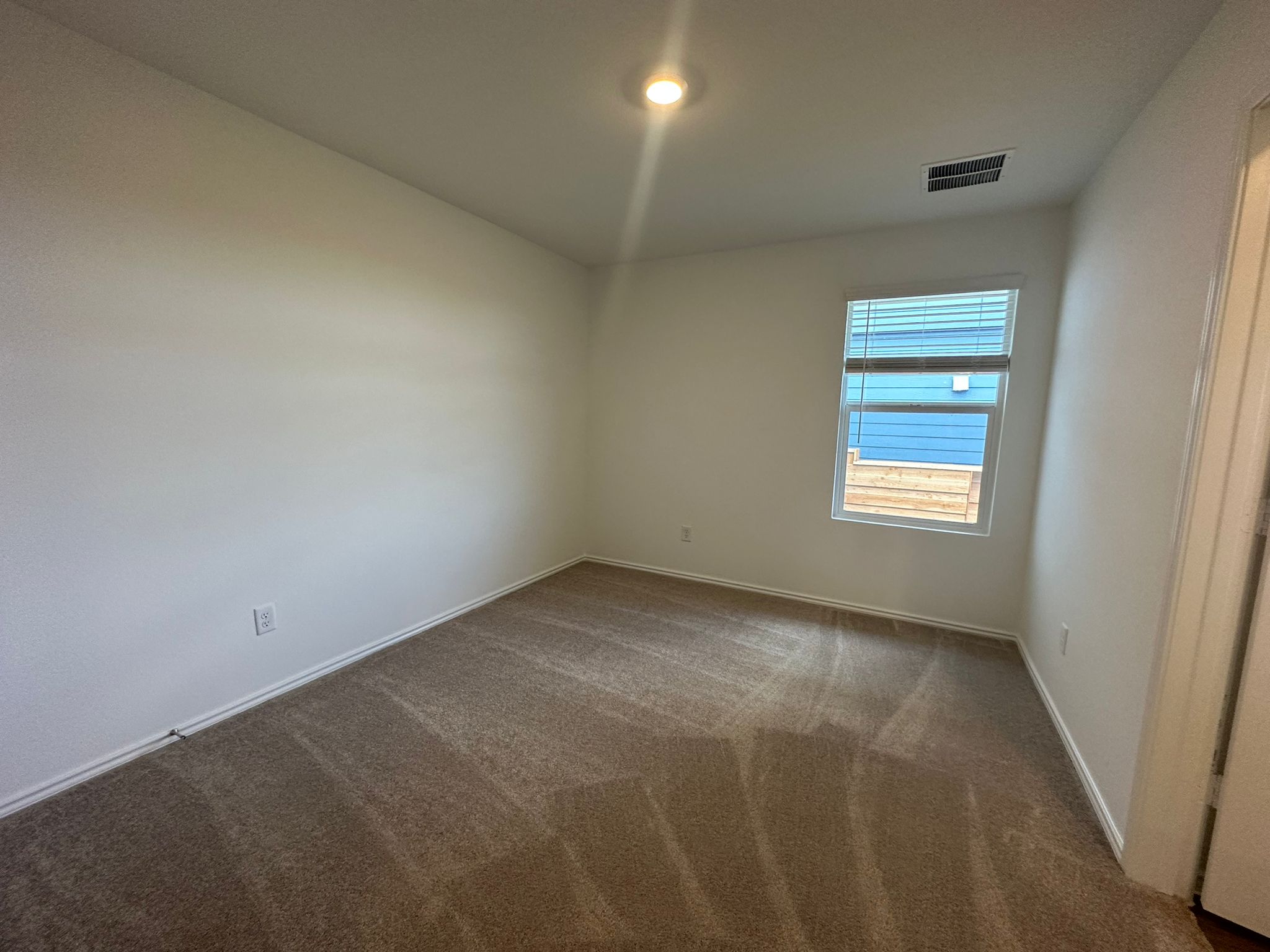 1594 Marley Kyle, TX 78640 - Photo 24 of 34 an empty room with a window