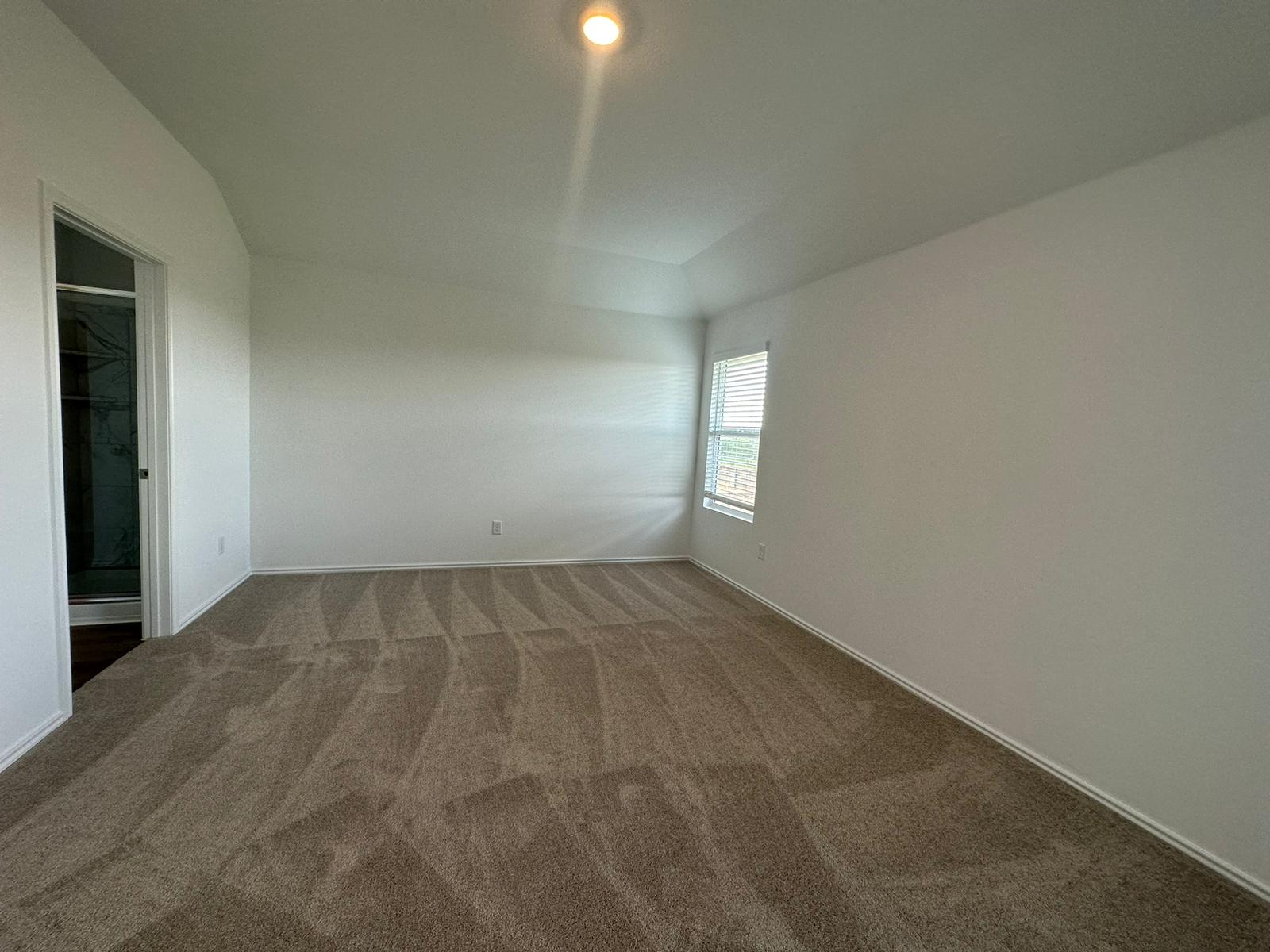 1594 Marley Kyle, TX 78640 - Photo 27 of 34 a view of an empty room and window