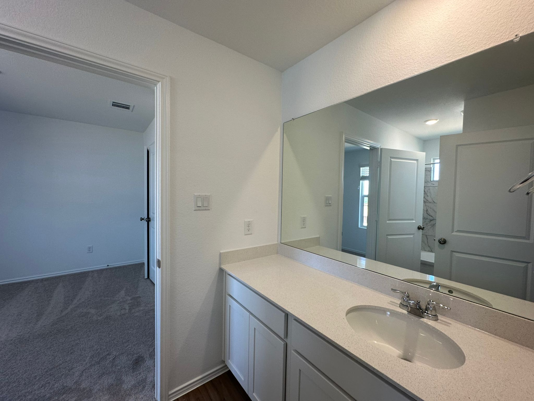 1594 Marley Kyle, TX 78640 - Photo 30 of 34 a bathroom with a sink and a mirror