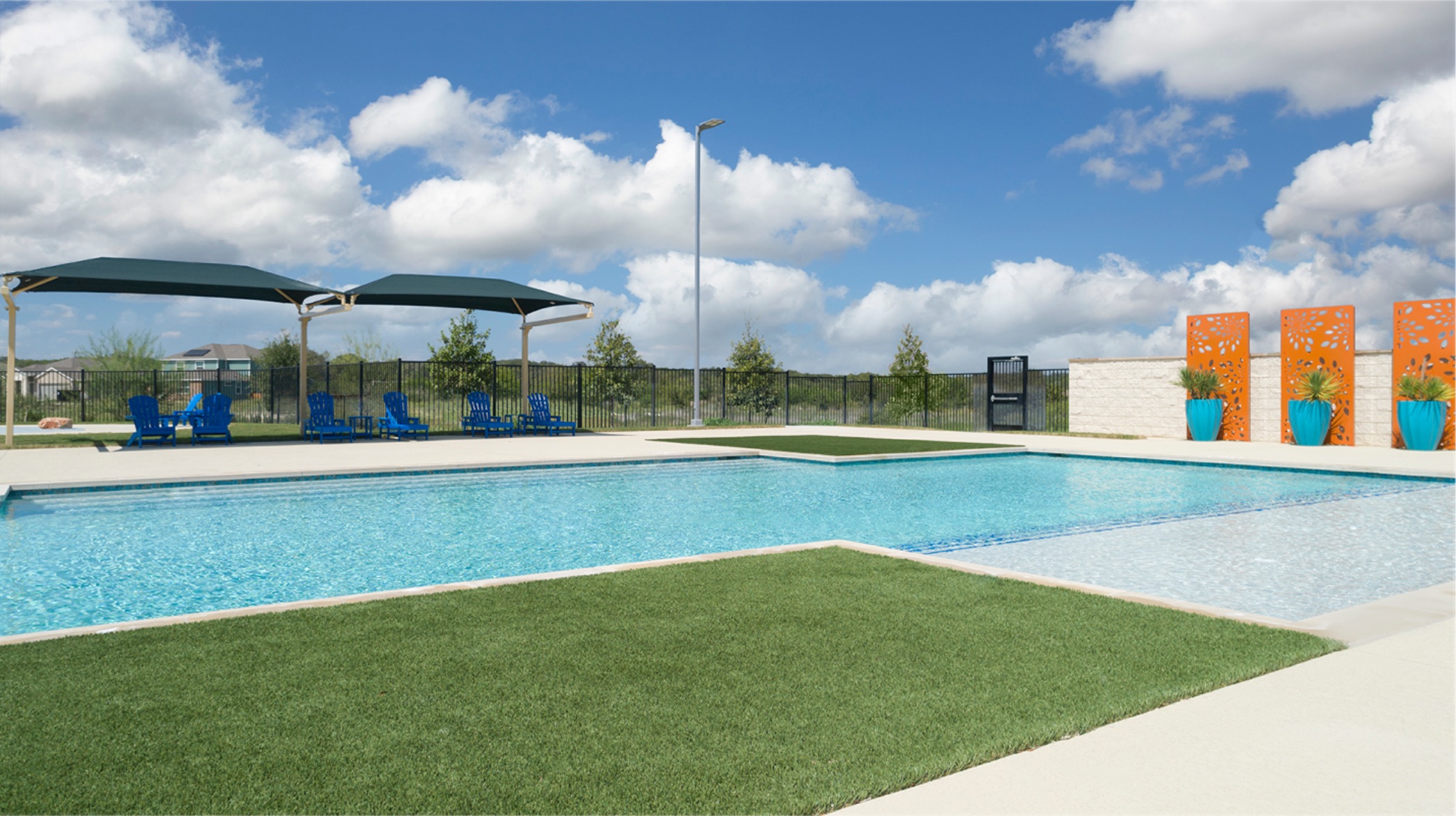1594 Marley Kyle, TX 78640 - Photo 6 of 34 a view of a swimming pool with an outdoor space and seating
