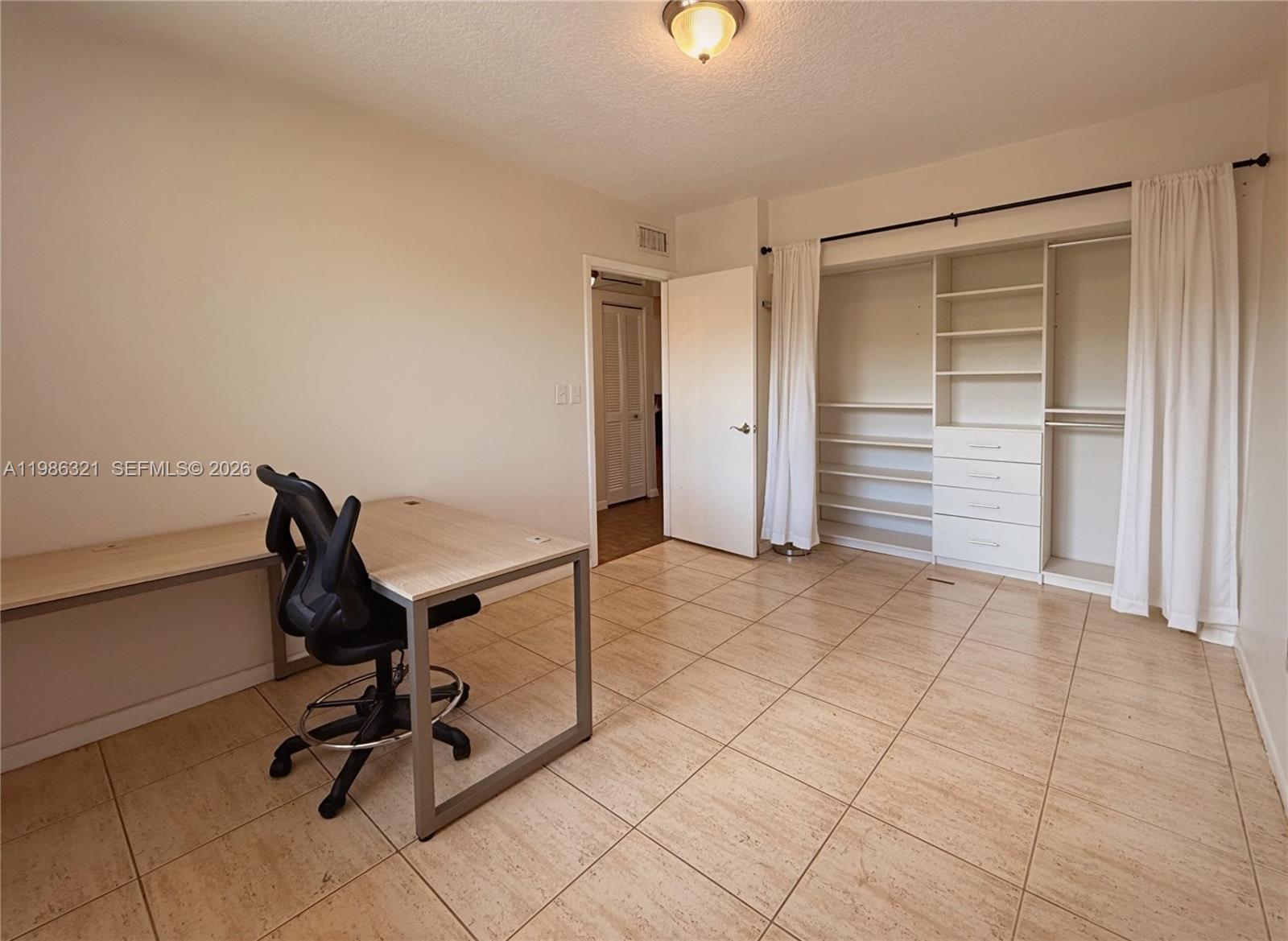 511 Ives Dairy Road, Unit 3016 Miami, FL 33179 - Photo 15 of 72 a view of workspace with windows