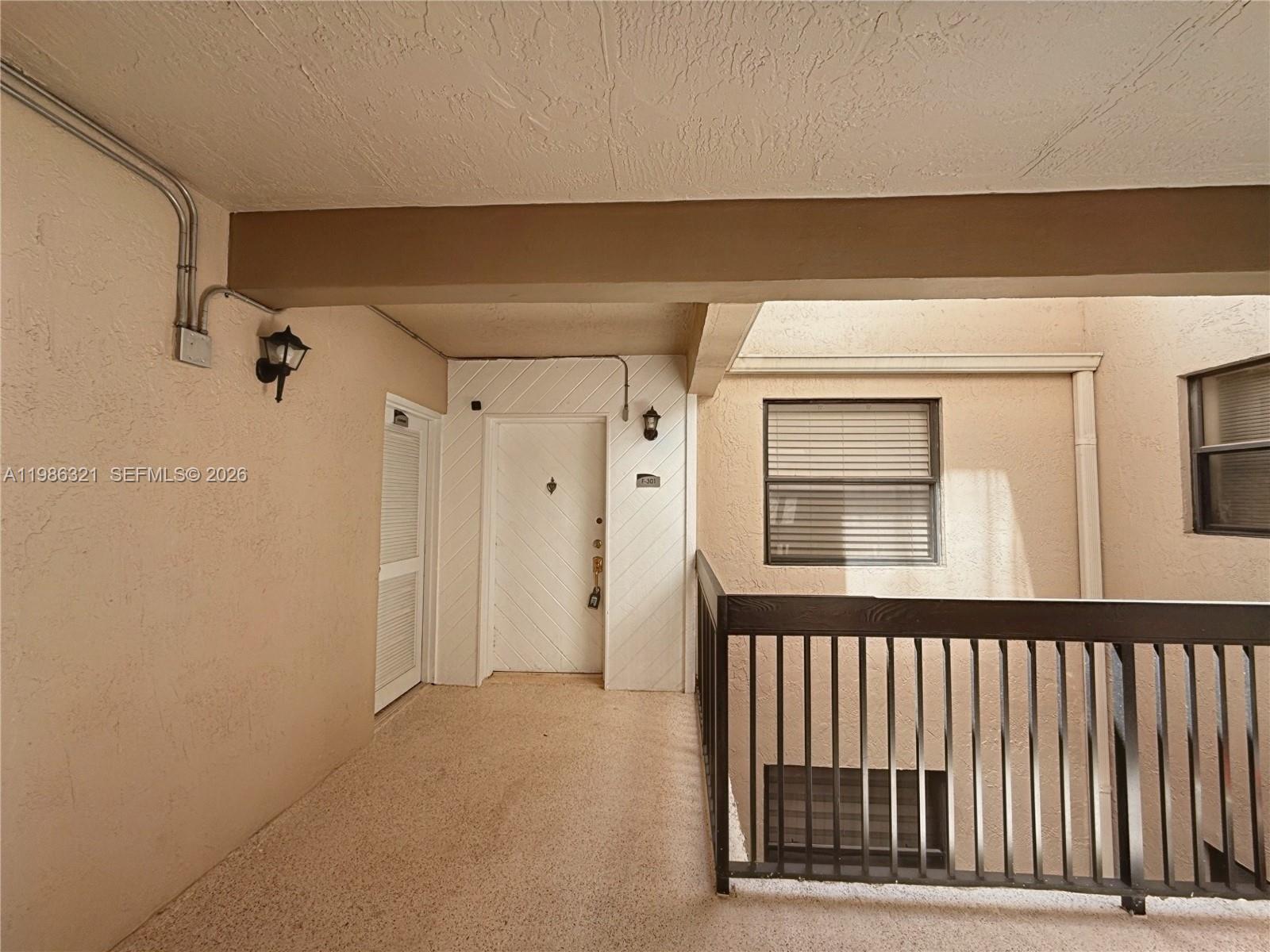 511 Ives Dairy Road, Unit 3016 Miami, FL 33179 - Photo 32 of 72 a view of a front door