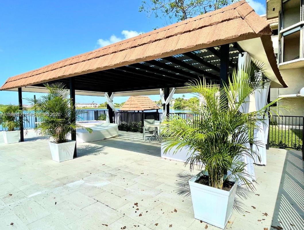 511 Ives Dairy Road, Unit 3016 Miami, FL 33179 - Photo 44 of 72 a view of outdoor space yard and porch