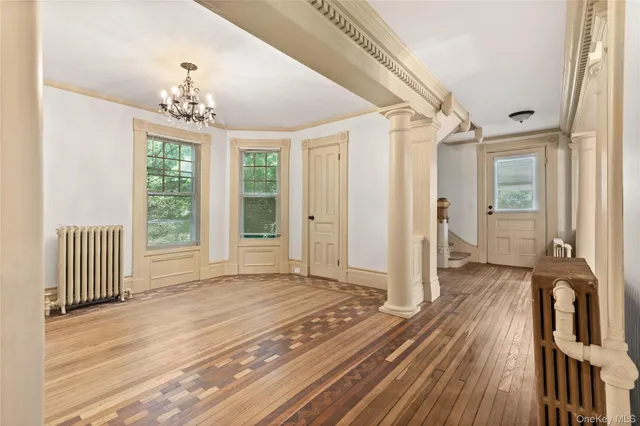 wooden floor and windows in an empty room