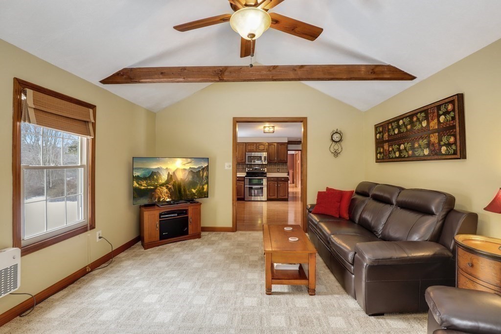 70 R Milk Street Blackstone, MA 01504 - Photo 11 of 40 a living room with furniture and a flat screen tv