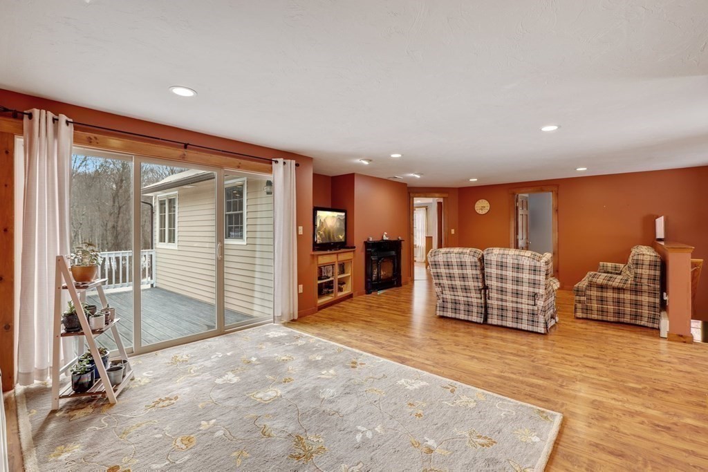 70 R Milk Street Blackstone, MA 01504 - Photo 15 of 40 en empty room with wooden floor and windows