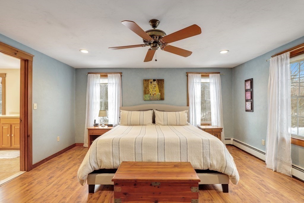 70 R Milk Street Blackstone, MA 01504 - Photo 19 of 40 a bedroom with a bed and a large window
