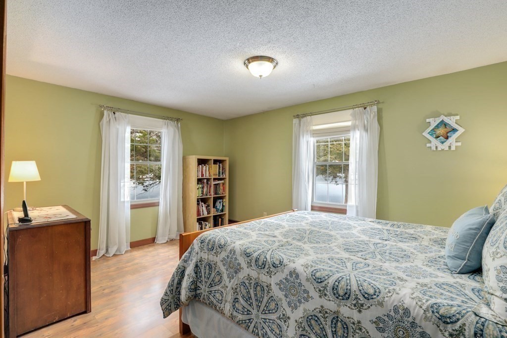 70 R Milk Street Blackstone, MA 01504 - Photo 26 of 40 a bedroom with a large bed and a window