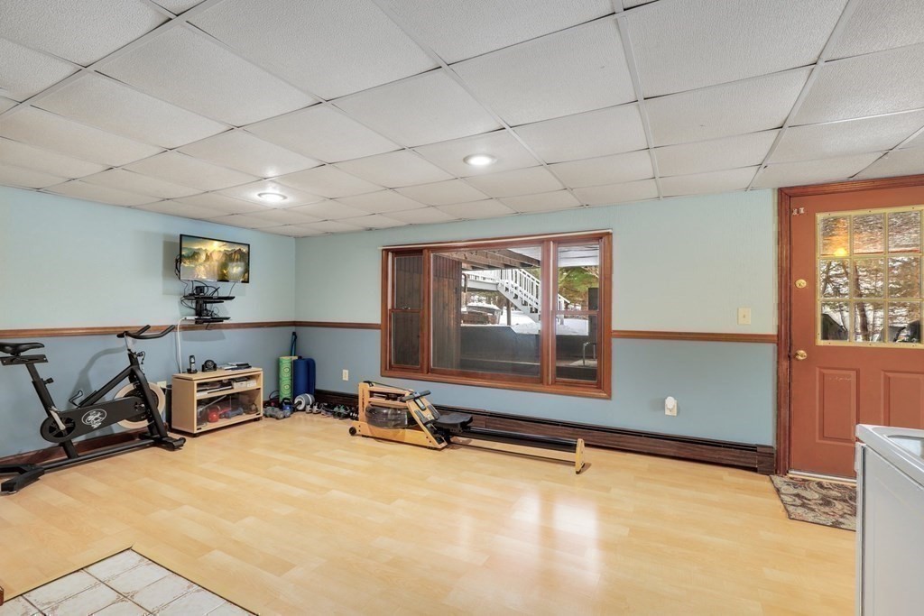 70 R Milk Street Blackstone, MA 01504 - Photo 28 of 40 a room with gym equipment and a window