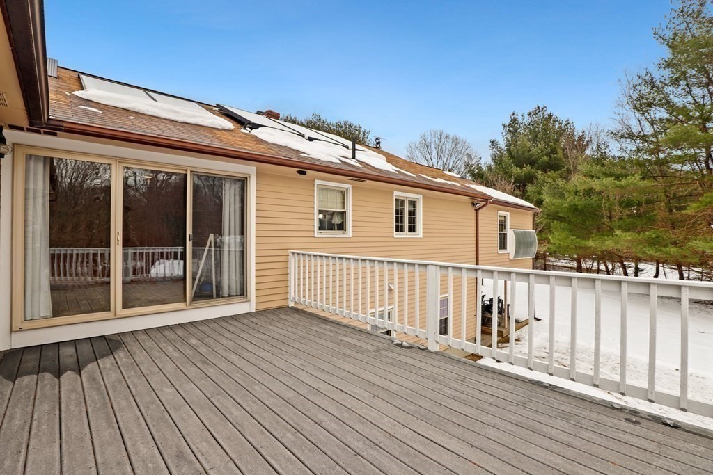 70 R Milk Street Blackstone, MA 01504 - Photo 37 of 40 a view of a house with a deck