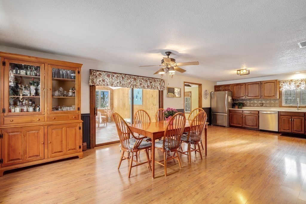 70 R Milk Street Blackstone, MA 01504 - Photo 5 of 40 a view of a dining room with furniture and chandelier