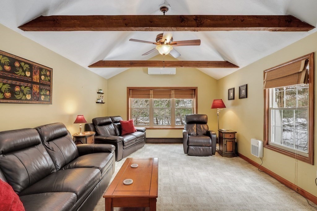 70 R Milk Street Blackstone, MA 01504 - Photo 10 of 40 a living room with furniture and a large window