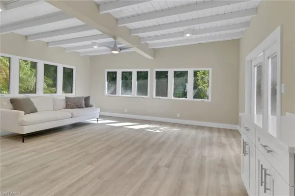 a view of livingroom with furniture wooden floor and window