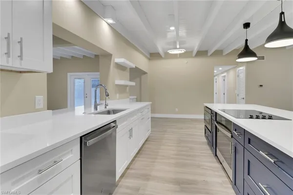 a large kitchen with a large island