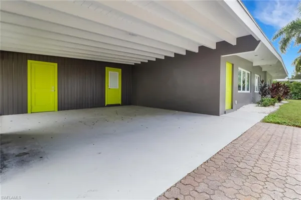 a view of a room with window and stairs