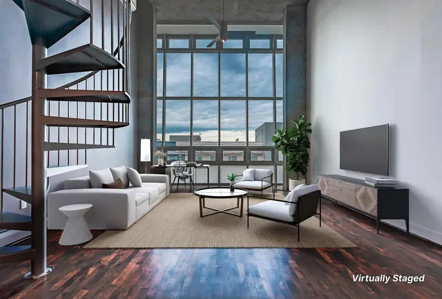 a living room with furniture or couch and a flat screen tv