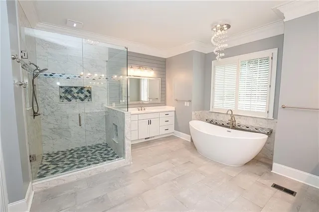 a kitchen with a granite countertop sink and a wooden floor
