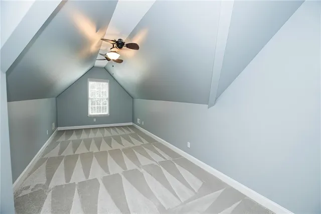 a view of a house with wooden floor and stairs