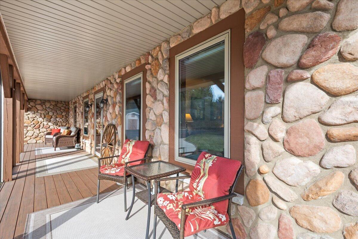 N5968 County Road P Herman, WI 53050 - Photo 10 of 66 Covered Front Porch Includes Furniture